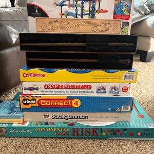 Various board games and puzzles for kids and adults